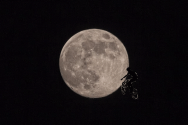 Cyclist Jumping In Front Of Super Moon GIF