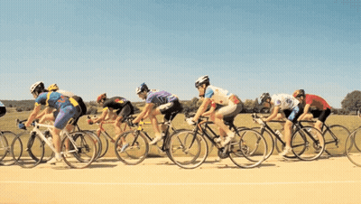 Cyclists Racing On Road GIF