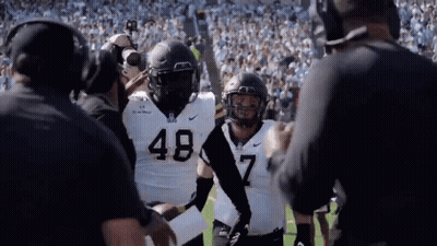 D. Evans Football Player In Helmet And Jersey GIF