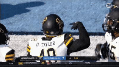 D. Taylor Football Player Pointing GIF
