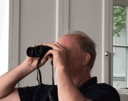 Dad Looking Thru Binoculars Close Up GIF