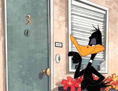 Daffy Duck In Front Of Door Number 3 GIF