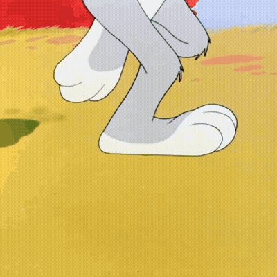 Daffy Duck Standing Next To Tree GIF