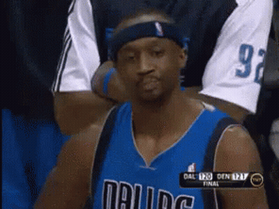 Dallas Basketball Player In Headband Sitting In Stands GIF