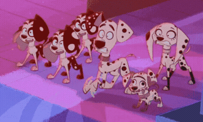 Dalmatian Dogs Standing In A Row GIF