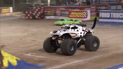 Dalmatian Monster Truck Driving Past Ford Truck Sign GIF