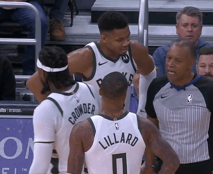 Damian Lillard Tapping Antetokounmpo's Back GIF