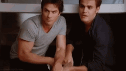 Damon And Stefan Salvatore Waving Hello GIF