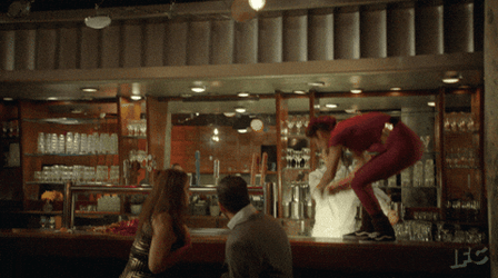 Dancing Above Bartender Counter GIF