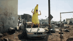 Dancing Banana Man On Top Of Car GIF