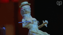 Dancing Creepy Looking Alien GIF