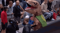 Dancing Dino Trex Mascot With Girl GIF