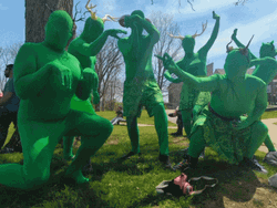 Dancing Green Men In Costume