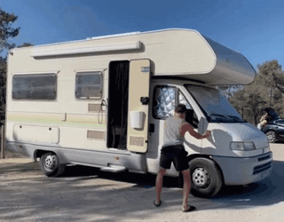 Dancing Man On Camper Trailer GIF