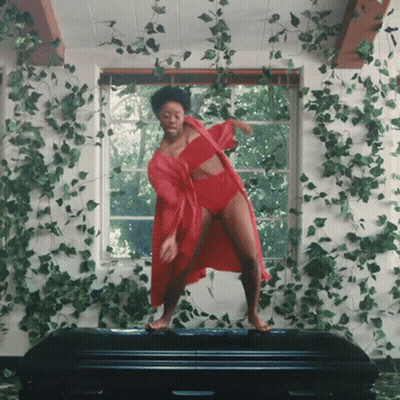 Dancing Men Carrying Coffin GIF