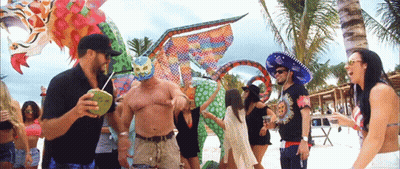 Dancing People On Beach With Luchador Mask GIF