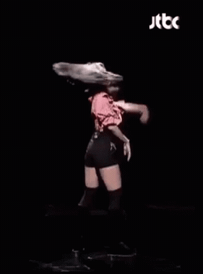 Dancing Woman With Microphone Pink Shirt Black Shorts GIF