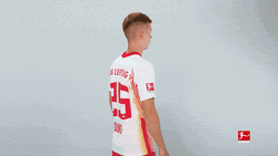 Dani Olmo Looking Sideways Crossed Arms GIF