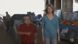 Danny Devito Strolling Then Dancing GIF