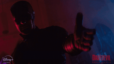 Daredevil Poster Man In Mask Holding Gun GIF