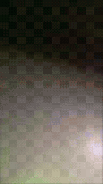 Dark Background With Spots Of Light GIF