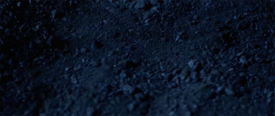 Dark Blue Background With Rocks And Dirt GIF