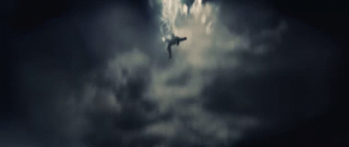 Dark Cloudy Sky Over Buildings GIF
