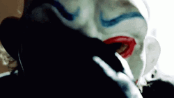Dark Knight Joker Removing Mask GIF