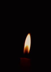 Dark Lighted Candle