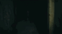 Dark Place With Crawling Man GIF