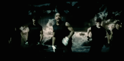 Dark Room Group, Black Shirt With Letter T GIF