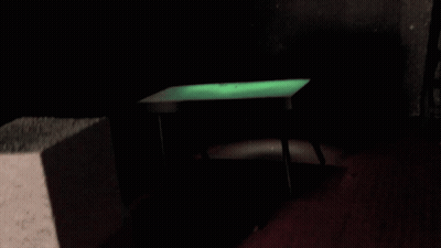 Dark Room With Chair And Ladder GIF