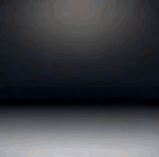 Dark Room With Light Shining On White Floor GIF