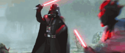 Darth Vader Is Holding Two Red Lightsabers In His Hands GIF