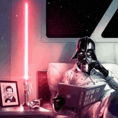 Darth Vader Is Reading A Book While Holding A Light Saber GIF