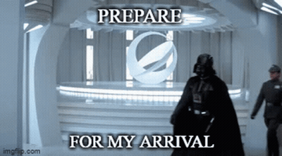 Darth Vader Is Standing In Front Of A Sign That Says Prepare For My Arrival .. GIF