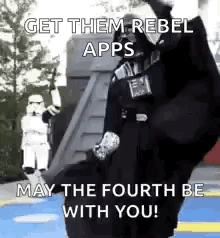 Darth Vader Is Standing In Front Of A Stormtrooper And A Building . GIF