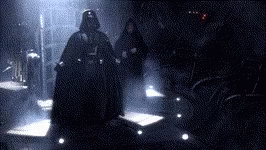 Darth Vader Is Standing In The Dark In A Room GIF