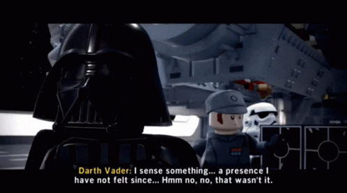 Darth Vader Is Talking To A Lego Man In Front Of A Ship GIF