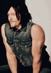 Daryl Dixon Flexing His Arms GIF