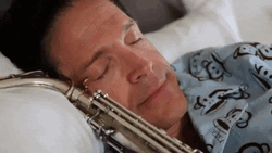 Dave Koz Wide Eyes Sleeping Meme GIF