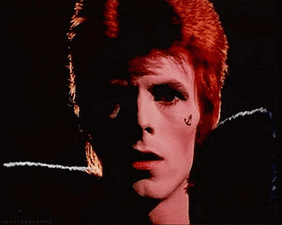 David Bowie Red HAir Tattoo On Cheek GIF