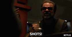 David Harbour Fist Pump Shots GIF