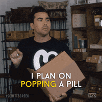David Rose Popping A Pill GIF