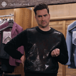 David Rose Suspicious Reaction Schitts Creek GIF
