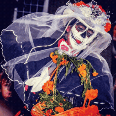 Day Of The Dead Costume Holding Basket Of Flowers GIF