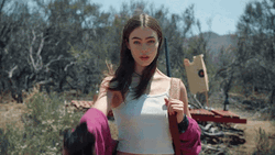 Dead Cat And Girl With Gun GIF