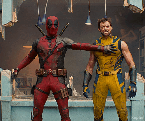 Deadpool And Wolverine Pose For A Picture Together GIF