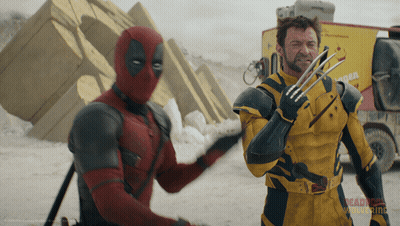 Deadpool And Wolverine Standing In Front Of X-Men Truck GIF