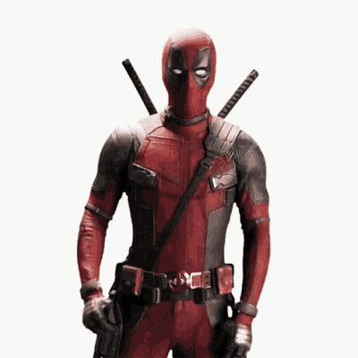 Hombre disfrazado de Deadpool sosteniendo un arma GIF